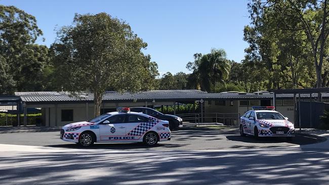 Police vehicles outside Coombabah State High school this morning.