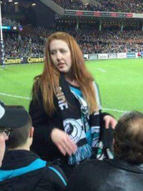 A screengrab of the video, which shows the women hurl the banana after Eddie Betts kicked a goal.