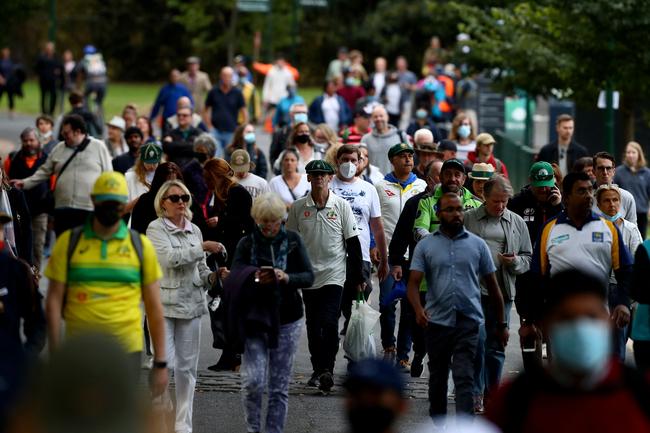 Cricket fans arrive to attend the state memorial service