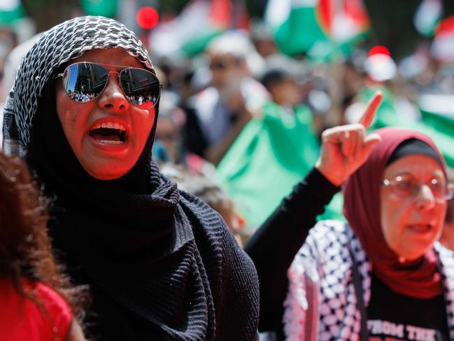 SYDNEY, AUSTRALIA - NewsWire Photos JANUARY 6, 2024. Pro-Palestinians are marching for the 13th weekend in a row to condemn IsraelÃs invasion of Gaza. They marched from Hyde Park and through the city. Picture: NCA NewsWire / David Swift