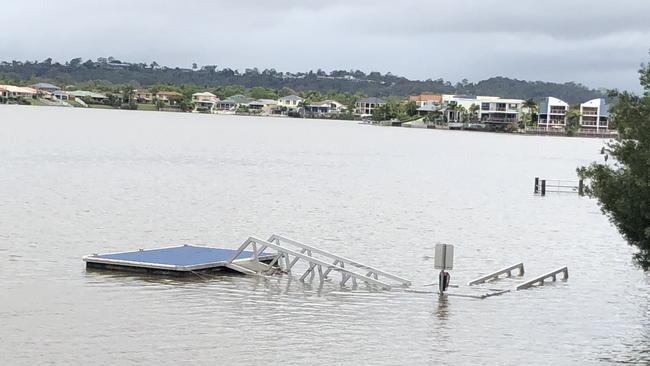 A pontoon lurches in Lake Orr, opposite Blackboard coffee shop in Varsity Parade. Pic: Laura Nelson.