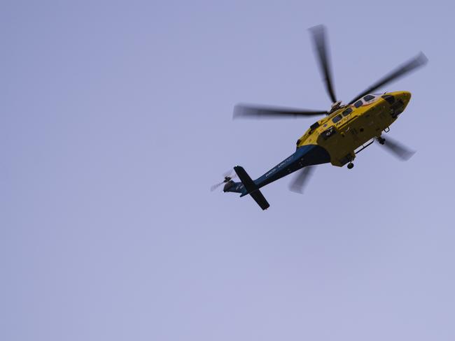 RACQ LifeFlight Rescue helicopter is seen over Toowoomba, Friday, February 19, 2021. Picture: Kevin Farmer