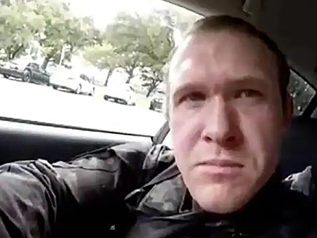 TOPSHOT - This image grab from a self-shot video that was streamed on Facebook Live on March 15, 2019 by the man who was involved in two mosque shootings in Christchurch shows the man in his car before he entered the Masjid al Noor mosque. - A "right-wing extremist" armed with semi-automatic weapons rampaged through two mosques in the quiet New Zealand city of Christchurch during afternoon prayers on March 15, killing 49 worshippers and wounding dozens more. (Photo by Handout / HANDOUT / AFP) / -----EDITORS NOTE --- RESTRICTED TO EDITORIAL USE - MANDATORY CREDIT "AFP PHOTO / HANDOUT" - NO MARKETING - NO ADVERTISING CAMPAIGNS - DISTRIBUTED AS A SERVICE TO CLIENTS - NO ARCHIVES