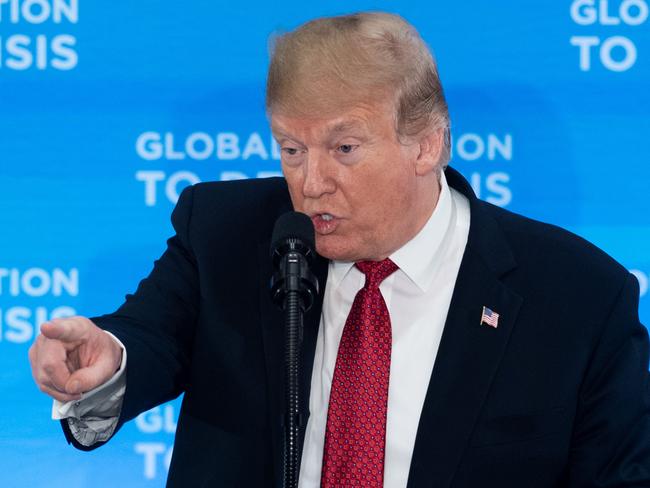 US President Donald Trump speaks to the Ministers of the Global Coalition to Defeat ISIS at the US State Department in Washington, DC, on February 6, 2019. - Trump said he expects '100 percent' of IS caliphate in Syria defeated in around week. (Photo by Saul LOEB / AFP) / ALTERNATIVE CROP