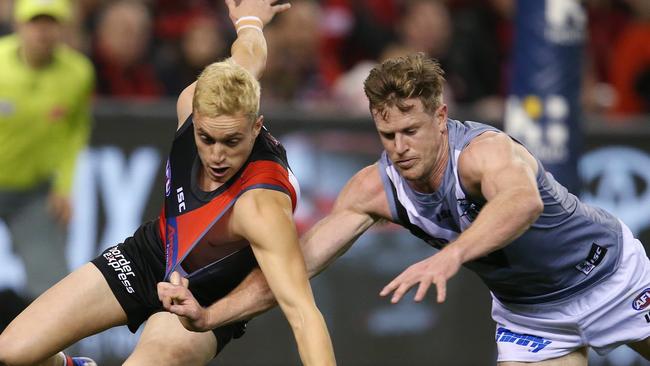 Port Adelaide co-captain Tom Jonas battles with his friend Orazio Fantasia. Picture: Michael Klein