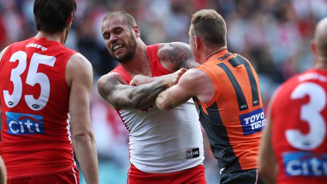 Sydney's Lance Franklin and Giant Steve Johnson came to blows on the quarter-time siren. Picture: Phil Hillyard