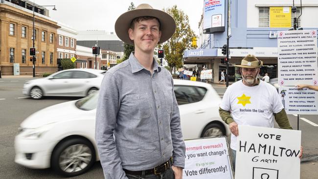 Australian Federation Party Groom candidate Ryan Otto (left) with political protesters including Jan Steen in the Toowoomba CBD. Picture: Kevin Farmer