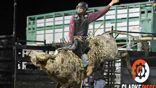 Shane Dyer competes in the Great Northern Bull riding series bull ride event at the Mossman Showgrounds. Picture: Stephen Harman