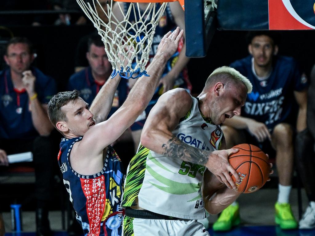 Mitch Creek of the Phoenix wins a rebound in front of Mitch McCarron. Picture: Mark Brake/Getty Images