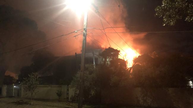 The fire engulfs the home on Tuesday night. Picture: James Mottershead