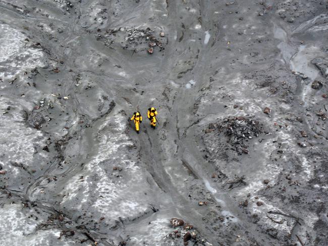 Specialists during the recovery operation at Whakaari/White Island. Picture: New Zealand Defence Force via Getty Images