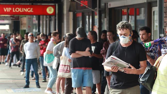 A Centrelink queue in Sydney. Picture: John Feder