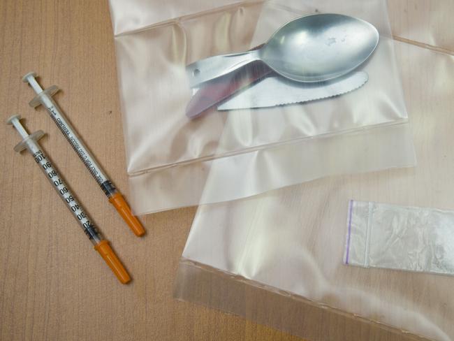 Methamphetamine and instruments picked up by police. Picture: Lachie Millard