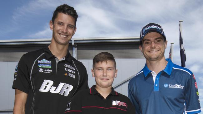 Holden Supercar driver Nick Percat and Ford Supercar driver Tim Slade with motor enthusiast Dylan Bailey, 12, at a rally calling on the State Government to reinstate the Adelaide 500. Picture: Emma Brasier.