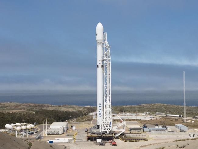 In this Sunday, June 25, 2017, photo released by SpaceX, a SpaceX Falcon 9 rocket is seen before lift off Sunday, carrying 10 more satellites for Iridium Communications, from Vandenberg Air Force Base, Calif. SpaceX has succeeded in landing a Falcon 9 first-stage booster on a vessel in the Pacific after a launch from California. The rocket lifted off from Vandenberg Air Force Base at 1:25 p.m. Sunday. It was carrying 10 satellites for Iridium Communications. The first-stage booster landed about 7 minutes later. The Falcon's second stage is continuing to carry the satellites toward orbit. (SpaceX via AP)