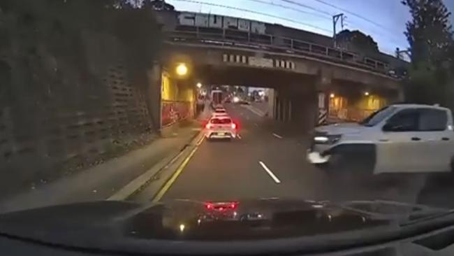 Granville shooting escape attempt yesterday afternoon. This video footage shows the white vehicle that was shot at trying desperately to escape, even crossing over the median strip on Woodville Rd before heading back to Church St.