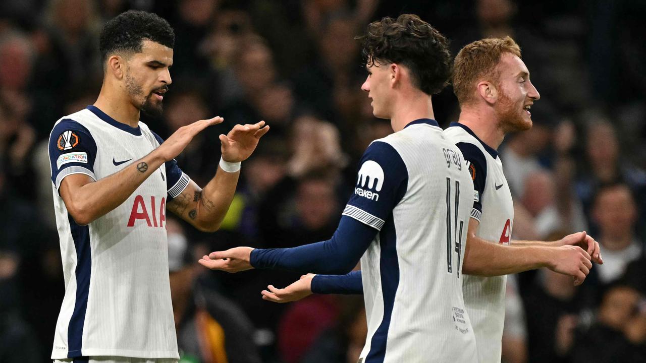 Tottenham Hotspur's English striker #19 Dominic Solanke (L) celebrates scoring the team's third goal with Tottenham Hotspur's English midfielder #14 Archie Gray during the UEFA Europa League League stage football match between Tottenham Hotspur and at the Tottenham Hotspur Stadium in London, on September 26, 2024. (Photo by Glyn KIRK / AFP)