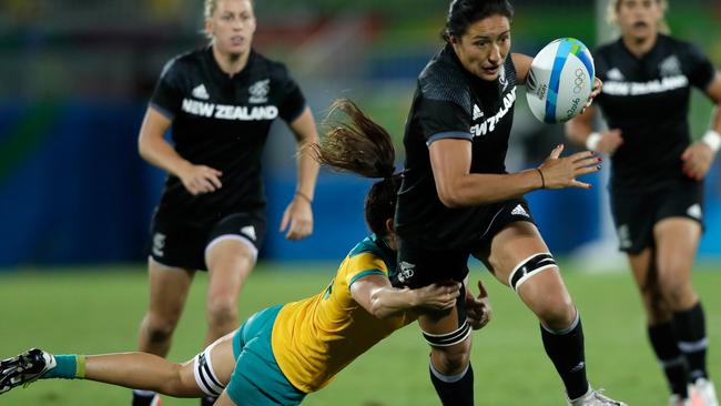 Alicia Quirk takes down Sarah Goss during the gold medal game.