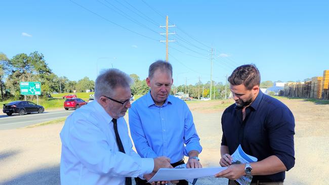 Michael Crandon, Bert van Manen and Mark Hammel — discussing M1 exit plans.