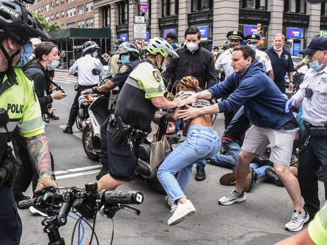 A protester is detained in New York. Picture: Getty/AFP