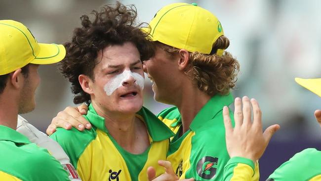 GEORGETOWN, GUYANA - JANUARY 14: Will Salzmann of Australia celebrates the wicket of Shaqkere Parris of West Indies with team mates Tobias Snell and Corey Miller during the ICC U19 Men's Cricket World Cup match between West Indies and Australia at Providence Stadium on January 14, 2022 in Georgetown, Guyana. (Photo by Ashley Allen-ICC/ICC via Getty Images)