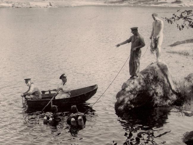 Recovering a body from a lake. Picture: Supplied