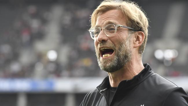 Liverpool's German manager Jurgen Klopp reacts prior the friendly football match Hertha Berlin vs Liverpool in Berlin, Germany, on July 29, 2017.  / AFP PHOTO / John MACDOUGALL