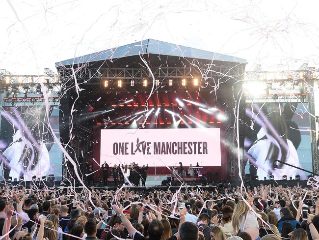 Singer Ariana Grande, onstage in white, performs at the One Love Manchester tribute concert in Manchester, north western England, Sunday, June 4, 2017. One Love Manchester is raising money for those affected by the bombing at the end of Ariana Grande’s concert in Manchester on May 22, 2017. Picture: Dave Hogan via AP