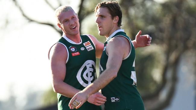 Josh Caddy celebrates a goal with Tom Bell. Picture: Nathan McNeill