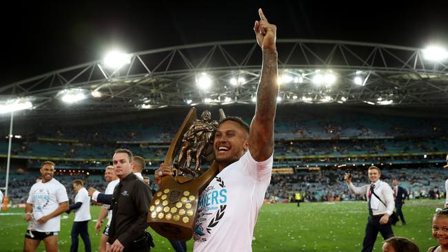 Shark's Ben Barba holds the premiership trophy after winning the 2016 NRL Grand Final between the Cronulla Sharks and Melbourne Storm at ANZ Stadium, Sydney. Picture: Brett Costello