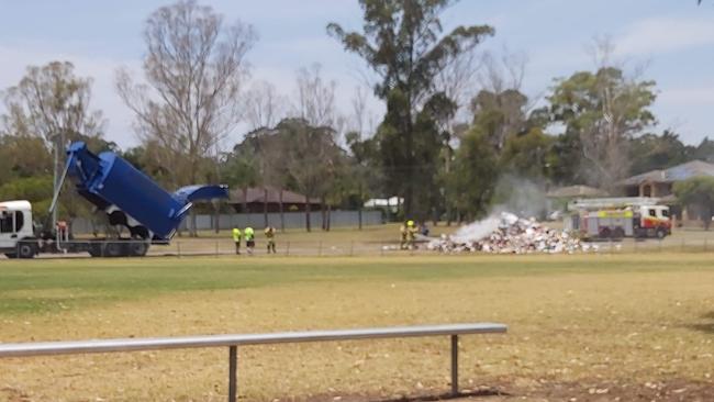 A garbage truck dumps its load at Rupertswood Park, Mt Druitt, after rubbish caught alight on November 25, 2019. Picture: Supplied