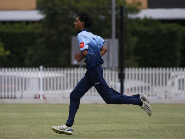 Arhan Shah charges towards the crease. Picture Warren Gannon Photography