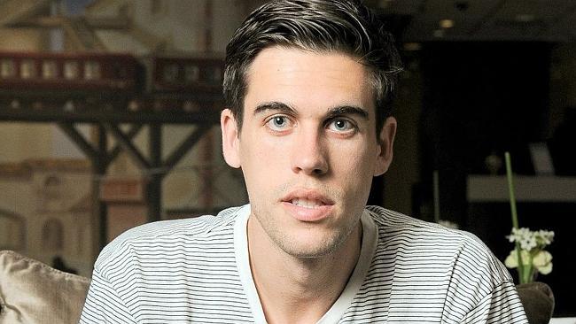 Author Ryan Holiday, with a copy of his earlier book &#39;Trust me, I&#39;m lying&#39;. Picture: Face