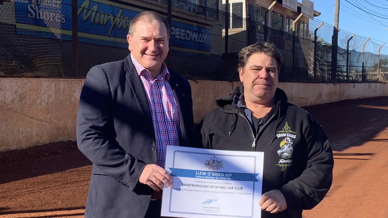 (L) MP Llew O'Brien presents a $15,000 grant to Paul Swindells, president of the Maryborough Sporting Car Club for sun shade upgrades to the Maryborough Speedway. Photo: Stuart Fast