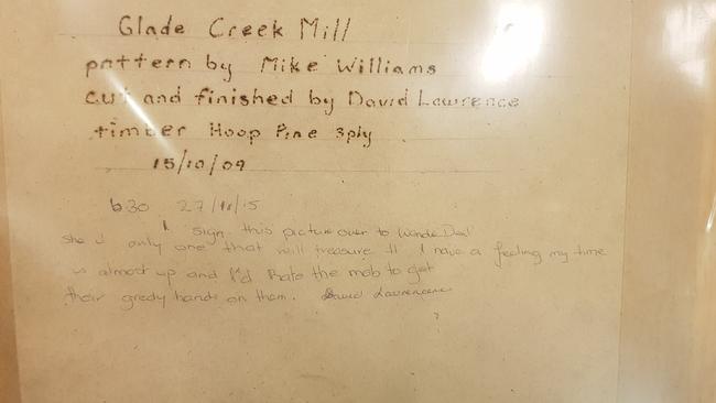 Notations on the back of David Lawrence's art, leaving it to Wendie-Sue Dent. Prosecutors say she wrote the notes herself. Source: Supreme Court.