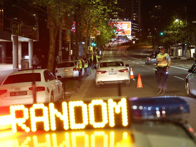 A man was allegedly found hiding in a garbage bin after leading police on a wild pursuit through Sydney on Friday night.