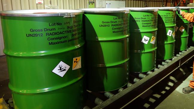 Adrian Boulton checks the packaged barrels of Uranium at BHP Billiton's Olympic Dam project in South Australia. The mine produces Copper, Gold, Silver & Uranium.