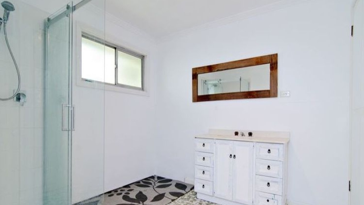 BEFORE: The bathroom in the house at 26 Gracemere St, Newmarket, before it was renovated.