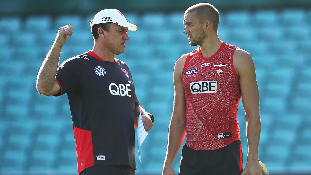 Swans coach John Longmire with Sam Reid at training. Picture: Phil Hillyard