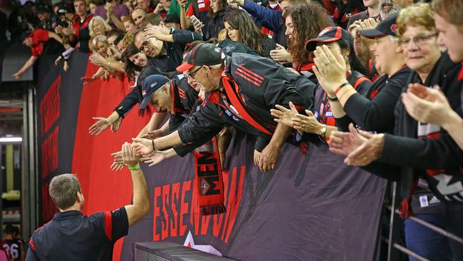 Bombers fans show their support for John Worsfold after the loss to North Melbourne.