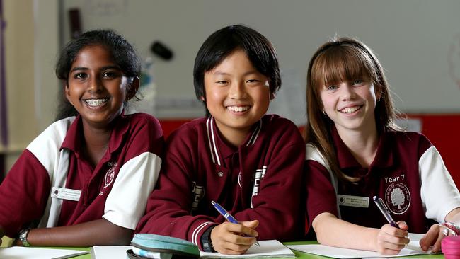 Linden Park Primary students Alokha Sureiander, Kyogo Sakai and Elise Martin. Linden Park Primary is a top performing public school, NAPLAN test results show. Photo: Calum Robertson.