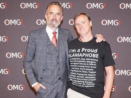 Jordan Peterson posed for a photo with a fan wearing an anti-Islam t-shirt