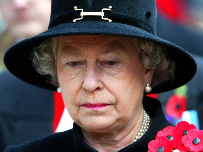 Queen Elizabeth II sheds a tear during the Field of Remembrance Service at Westminster Abbey, London. The Queen opened the ceremony the annual open air service in St Margaret’s churchyard, held in memory of Britain’s war heroes by laying down a small wooden cross bearing a scarlet poppy in the field. 07/11/2002 Picture: Supplied