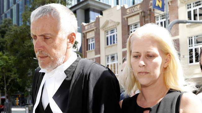 Heidi Strbak arrives with her lawyer at the Supreme Court in Brisbane on November 7, 2017.