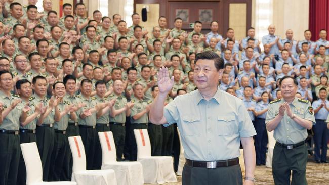 Chinese President Xi Jinping meets with military officers and troops stationed in northwest China's Xinjiang Uygur Autonomous Region.