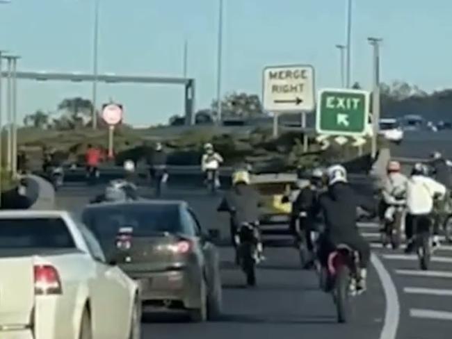 At least 20 teens were filmed doing wheelies and driving erratically on the Tullamarine Fwy.