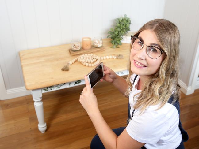 Daniela Busk from Wynnum West, with her items she sells on Facebook Marketplace as part of her business The chalk house, Saturday February 20th 2021 - Photo Steve Pohlner