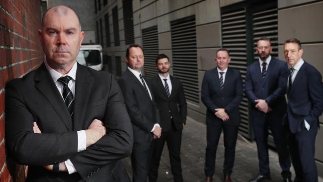 Feature on the Armed Crime Squad.  Front- D/Insp Adam Tilley- Background. Det/Sen/Sgt Al Hanson, D/Sgt Mark Walsh, D/A/S/Sgt Brad Potts, , D/Sgt Paul Mullenger and D/A/S/Sgt Dave Shannon. Wednesday, August 21. 2024. Picture David Crosling