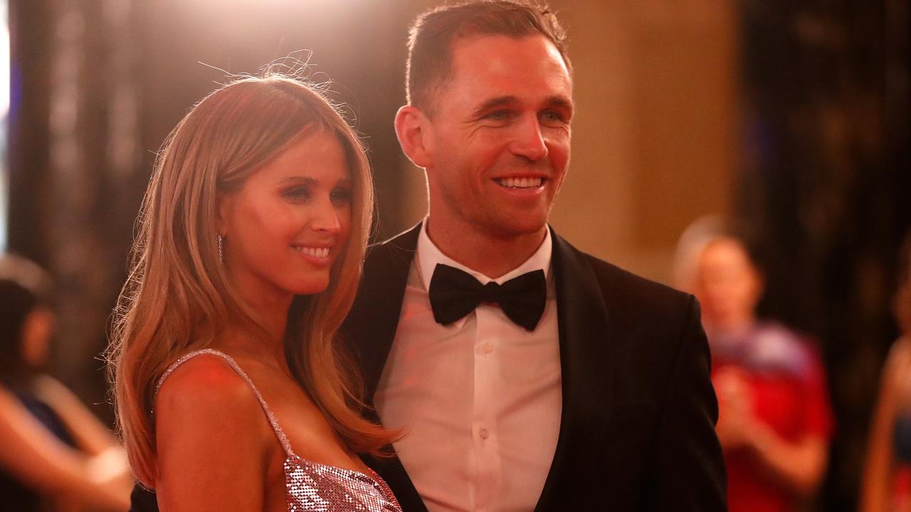 Joel and Britt Selwood arrive at the Brownlow Medal count.