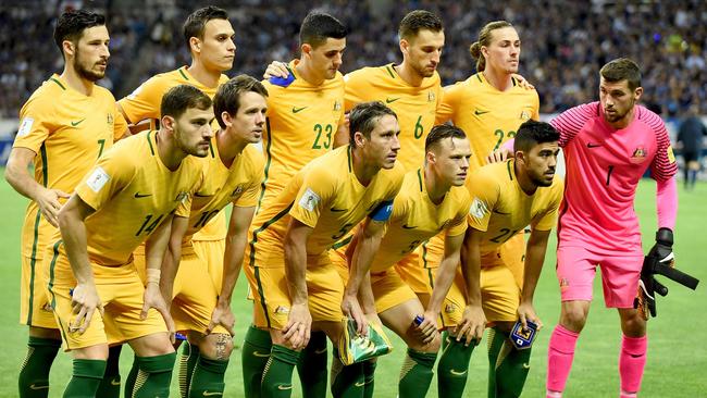 The Socceroos will wear white socks in honour of Mike Cockerill.